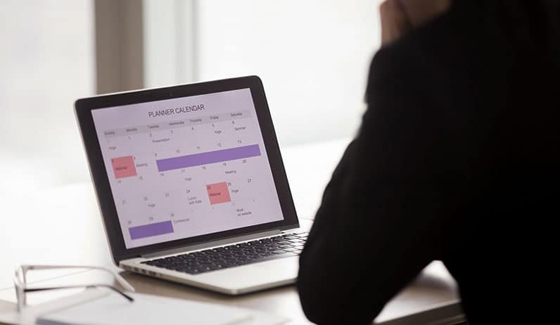 open laptop showing calendar