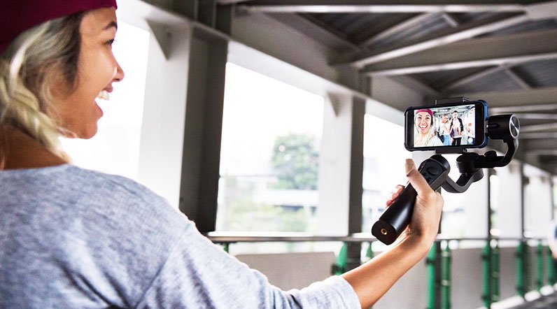 girl videocall holding phone