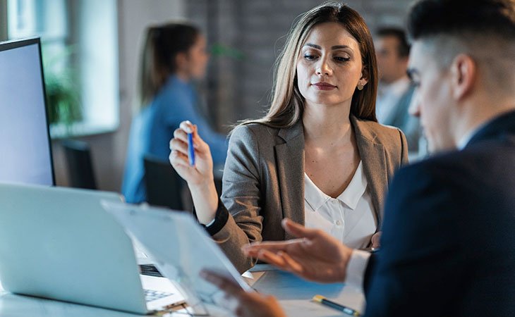 confident woman in an interview with a man