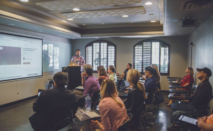 Trends In The Staffing Industry: Expert Insights &Amp; Strategy Independent Recruiter LLC | Staffing Agency man talking to a group of people with a presentation