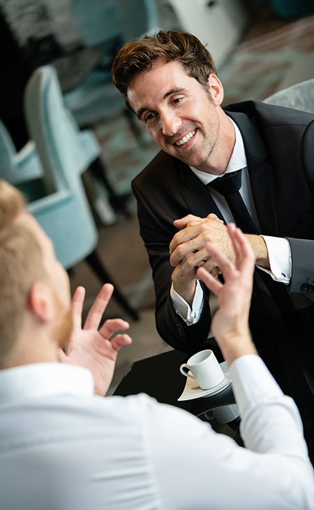 smiling men in a job interview