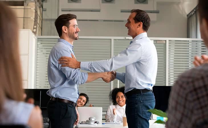 two men handshaking on a meeting