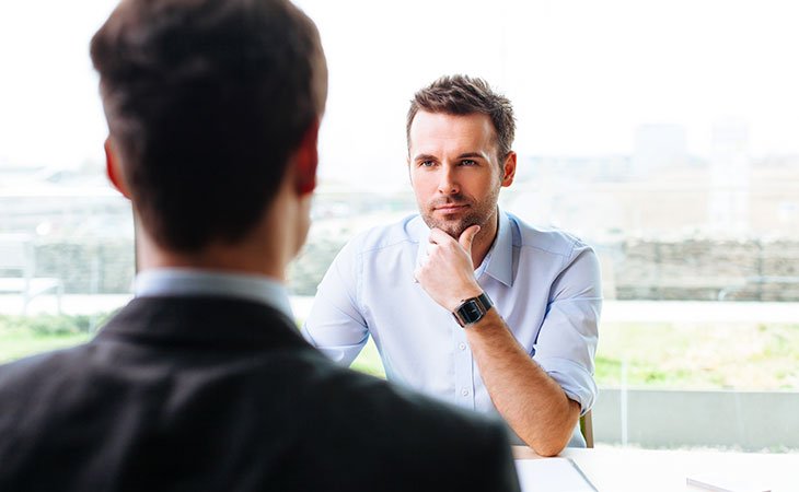 two men negotiating