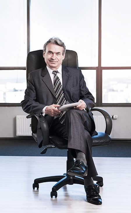 executive sitting on a chair
