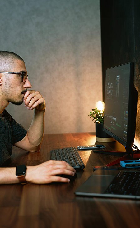 How To Find A Job: Expert Guide For Mastering Job Hunting Independent Recruiter LLC | Staffing Agency guy-looking-computer-screen