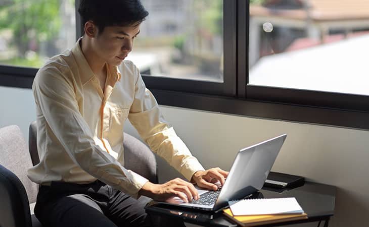 man working on a laptop