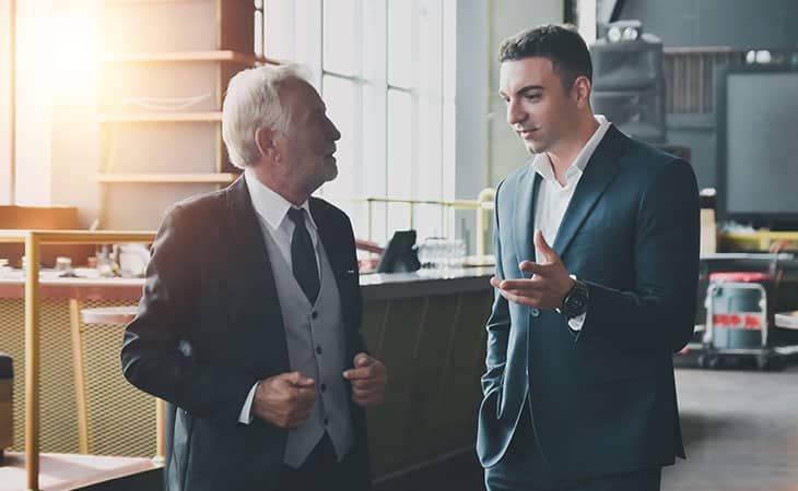 two men talking
