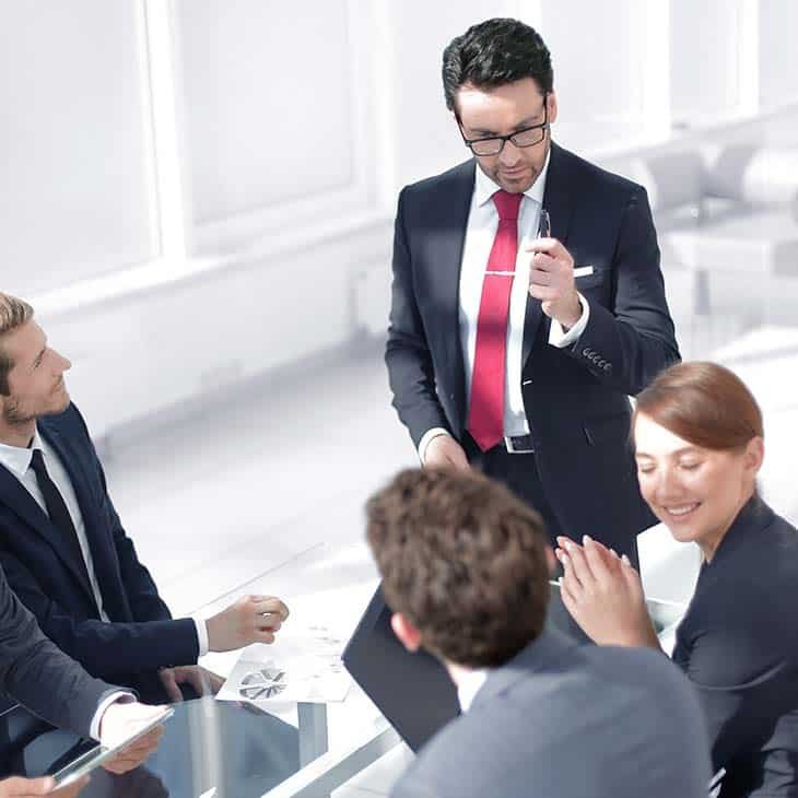 businessman-talking-team