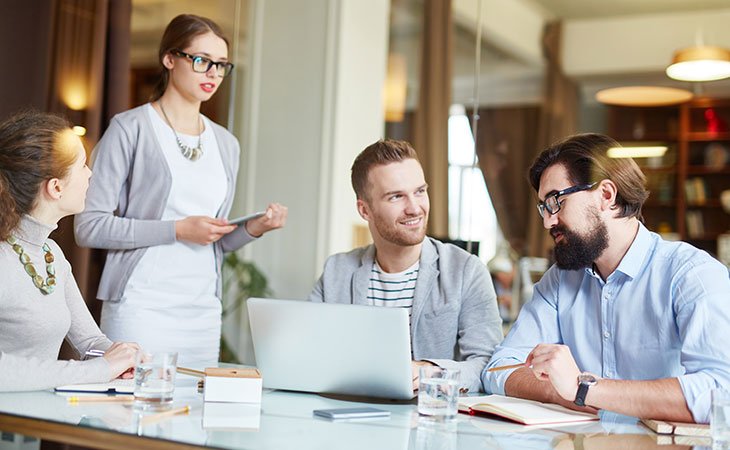 group-people-meeting-laptop-table