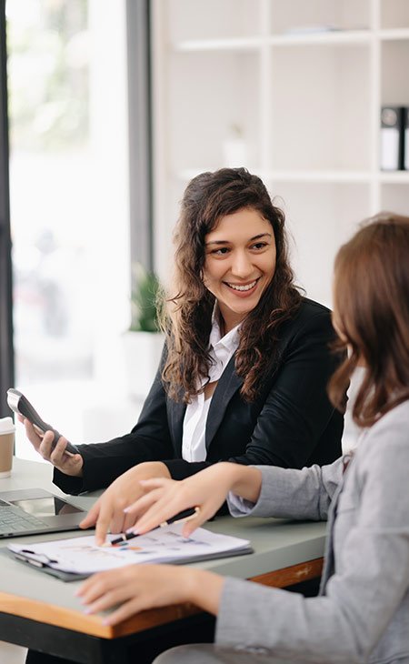 happy-women-talking-office