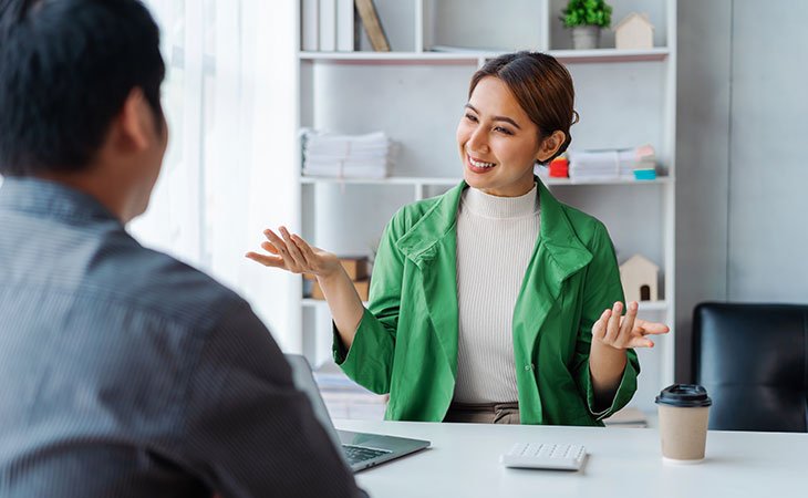 woman-hands-open-talking-man