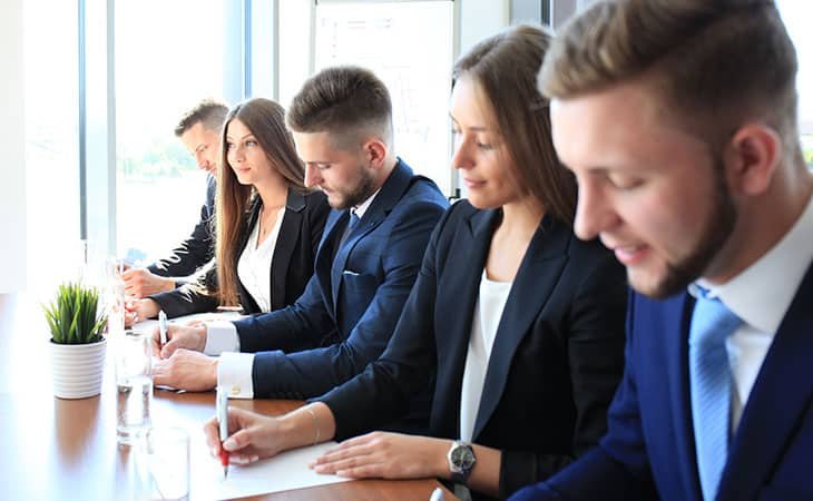 group-business-people-writing