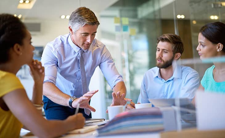 man-explaining-gestures-group