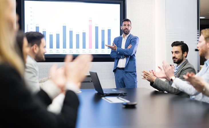 man-presentation-meeting-people-applause