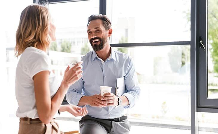 woman-man-happy-talking-coffee