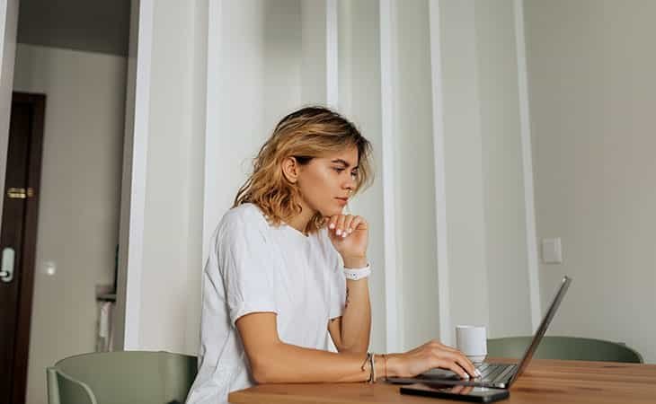 woman-using-laptop-home