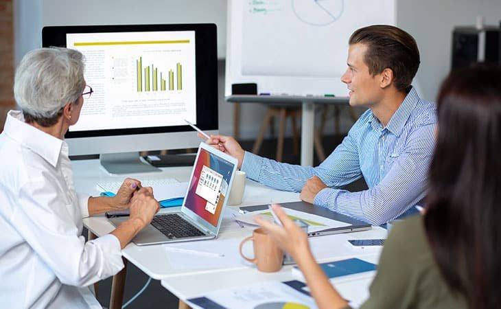 man-pointing-screen-statistics
