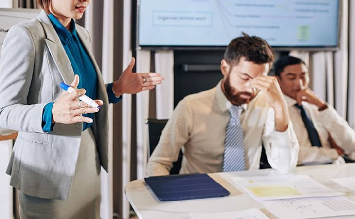 meeting-woman-talking-man-hand-nose