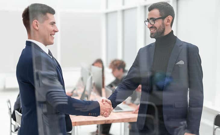 men-handshake-office