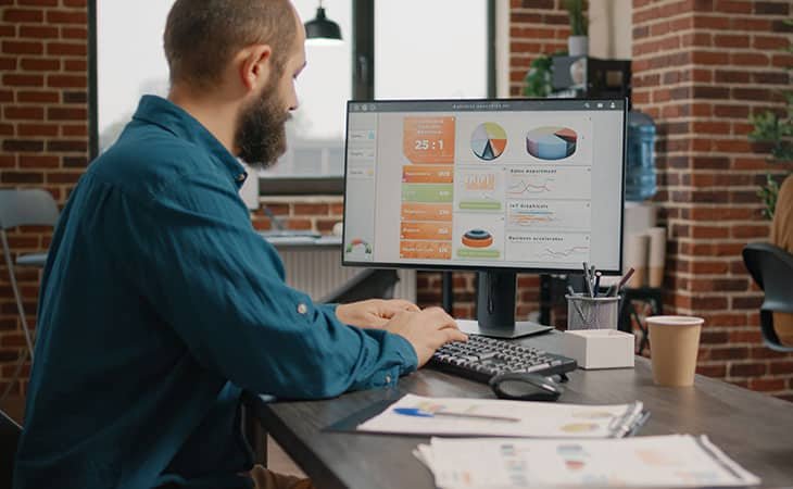 man-working-computer-data