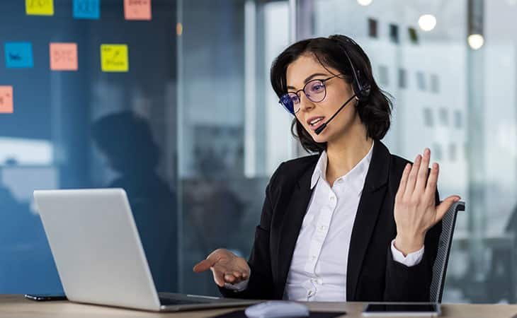 woman making a video conference and making gestures