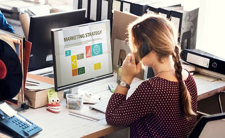 woman-phone-computer-marketing
